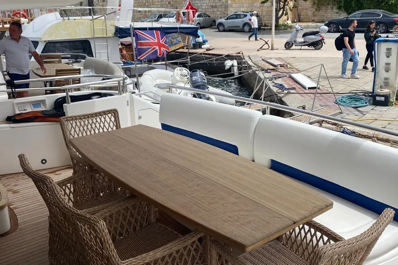 75 Princess 2008 Yacht Photos Pics Outdoor seating on 2008 Princess 75 Motor Yacht docked at marina.