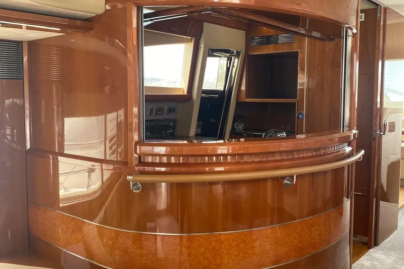 75 Princess 2008 Yacht Photos Pics Luxurious interior of 2008 Princess 75 Motor Yacht with polished wood finish.