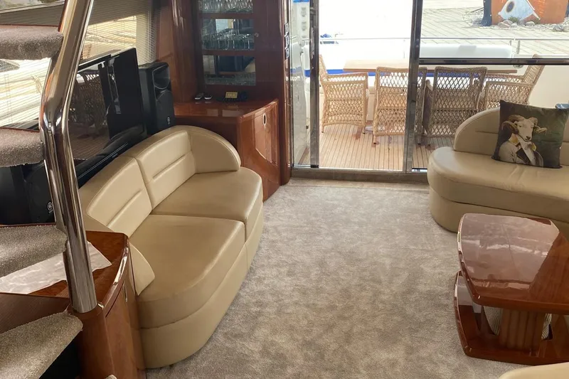 75 Princess 2008 Yacht Photos Pics Luxurious interior of 2008 Princess 75 Motor Yacht with elegant seating and wooden accents.