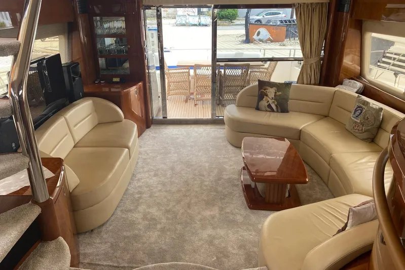 75 Princess 2008 Yacht Photos Pics Luxurious interior of a 2008 Princess 75 Motor Yacht with elegant seating and decor.