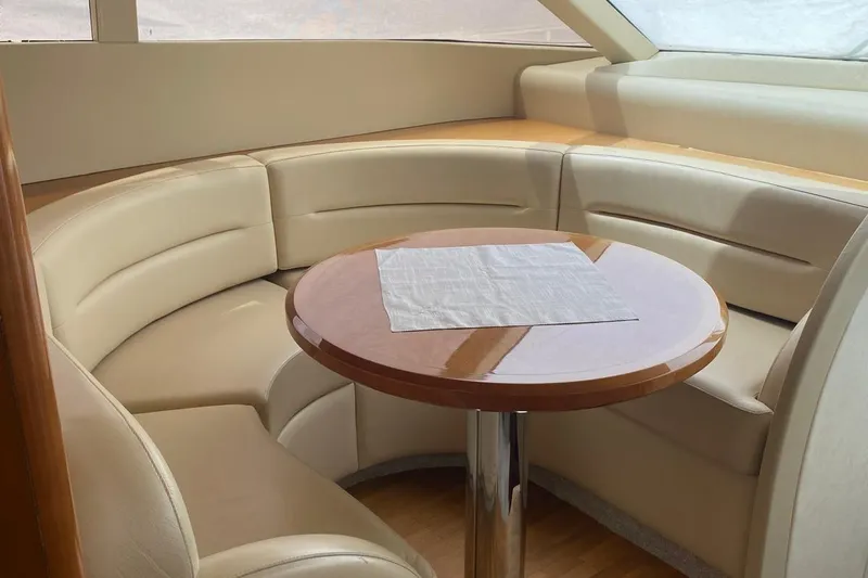 75 Princess 2008 Yacht Photos Pics Luxurious seating area in 2008 Princess 75 Motor Yacht with elegant table setting.