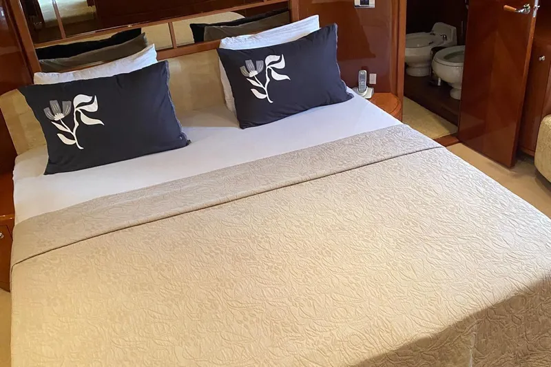 75 Princess 2008 Yacht Photos Pics Luxurious bedroom interior on 2008 Princess 75 Motor Yacht with elegant bedding and decor.