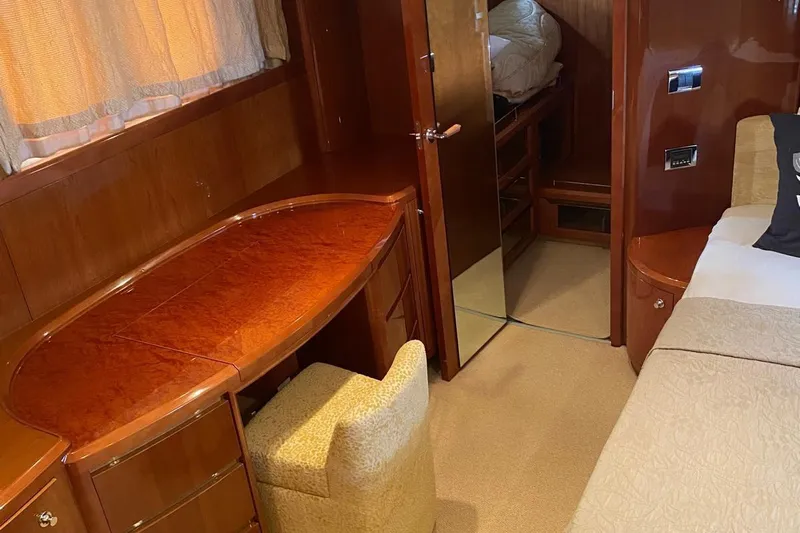 75 Princess 2008 Yacht Photos Pics Interior of 2008 Princess 75 Motor Yacht with elegant wood finish and cozy furnishings.