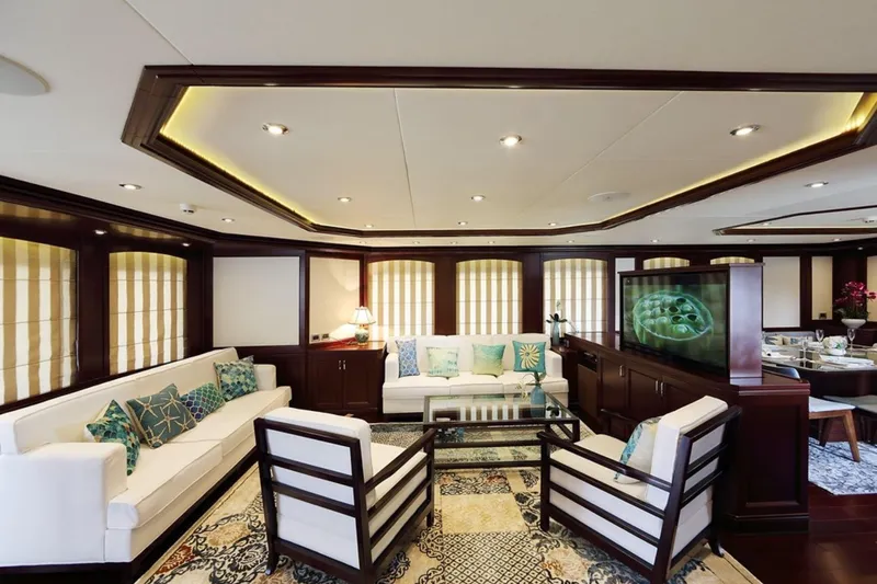 Samsara Yacht Photos Pics Luxurious yacht interior with elegant seating, modern decor, and ambient lighting, Custom Dauntless 2017.