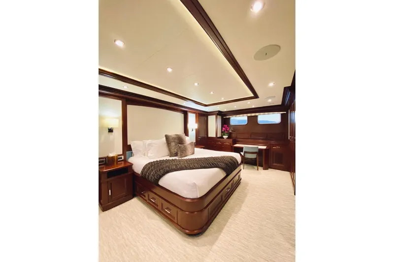 Samsara Yacht Photos Pics Luxurious 2017 Custom Dauntless yacht bedroom with elegant wood finishes and modern lighting.