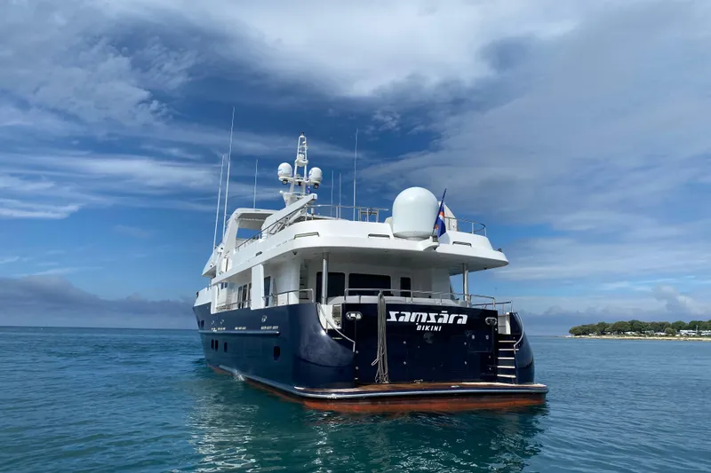 Samsara Yacht Photos Pics Luxury yacht "Samsara" by Dauntless, 2017 model, anchored in serene waters.