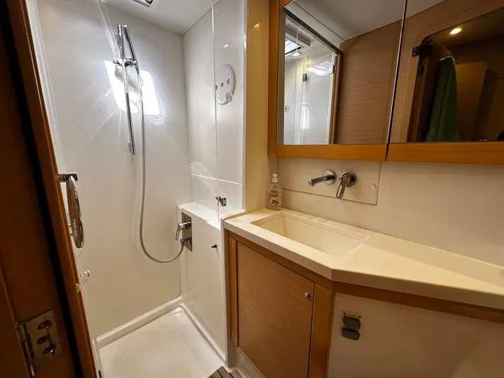 Flotation Therapy Yacht Photos Pics Modern bathroom in 2019 Lagoon 450F yacht with shower and sink.