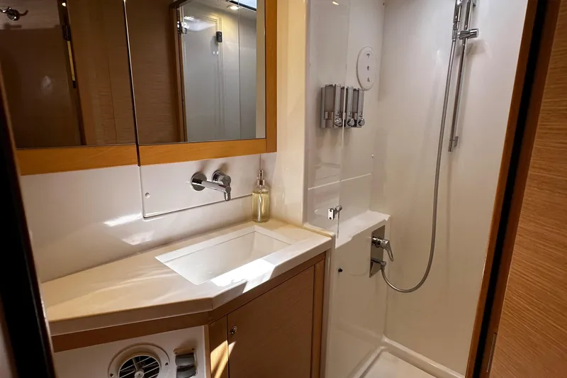 Flotation Therapy Yacht Photos Pics Modern bathroom in 2019 Lagoon 450F yacht with shower and sink.