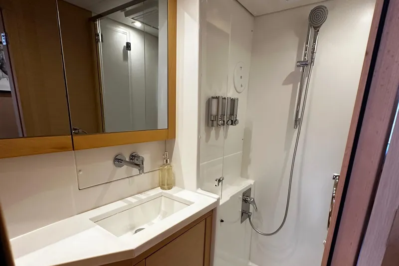 Flotation Therapy Yacht Photos Pics Modern bathroom in 2019 Lagoon 450F yacht with shower and sink.