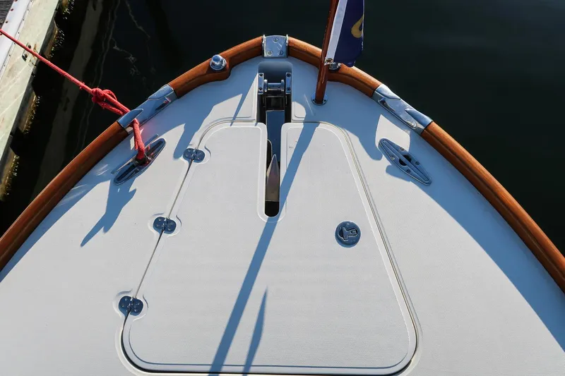 Amar Yacht Photos Pics Bow of 2004 Hinckley Talaria 29 Runabout with wooden trim and deck fittings.