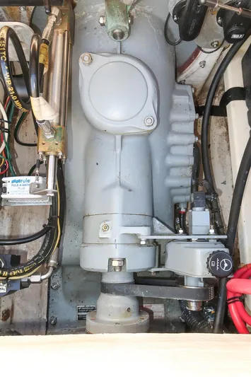 Amar Yacht Photos Pics Engine compartment of a 2004 Hinckley Talaria 29 Runabout, showcasing mechanical components and wiring.