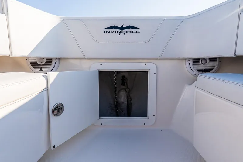 Blue Eyes Yacht Photos Pics Open storage compartment on 2016 Invincible 33 Open Fisherman boat interior.