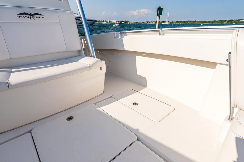Blue Eyes Yacht Photos Pics 2016 Invincible 33 Open Fisherman boat interior with seating and ocean view.