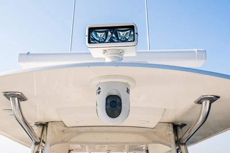 Blue Eyes Yacht Photos Pics 2016 Invincible 33 Open Fisherman boat with advanced navigation equipment.