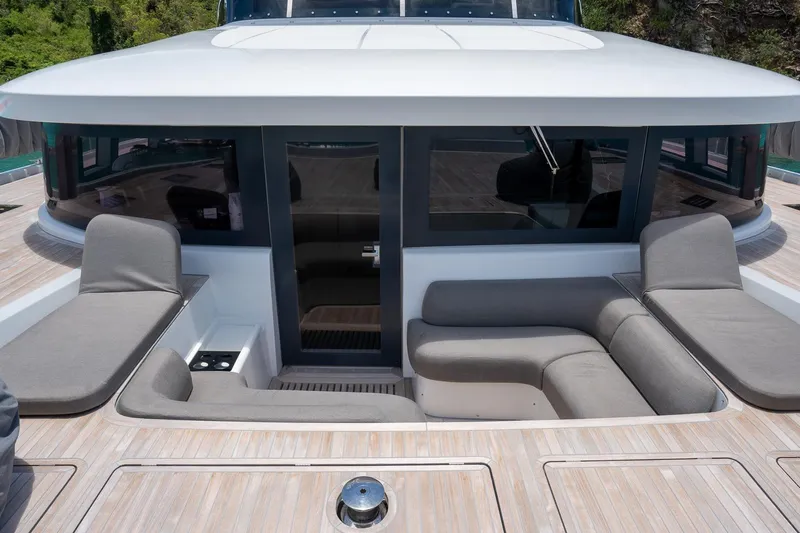 Cest La Vie Yacht Photos Pics Luxurious 2022 Lagoon SIXTY 7 yacht with spacious outdoor seating area.