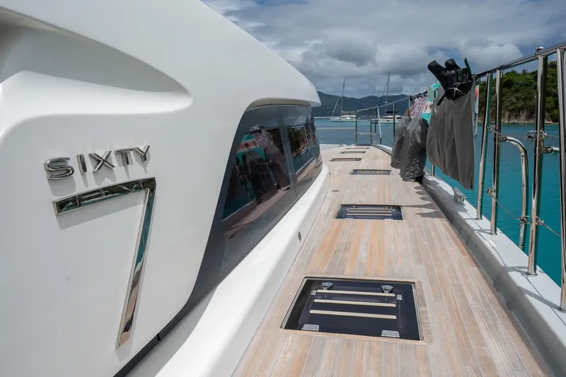 Cest La Vie Yacht Photos Pics 2022 Lagoon SIXTY 7 yacht deck with ocean view and clothing drying.