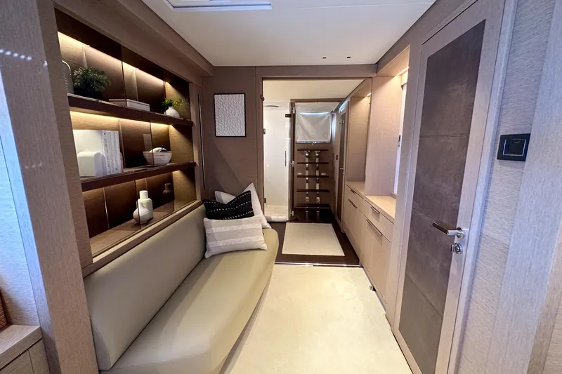 Cest La Vie Yacht Photos Pics Luxurious interior of 2022 Lagoon SIXTY 7 yacht, featuring elegant seating and modern decor.