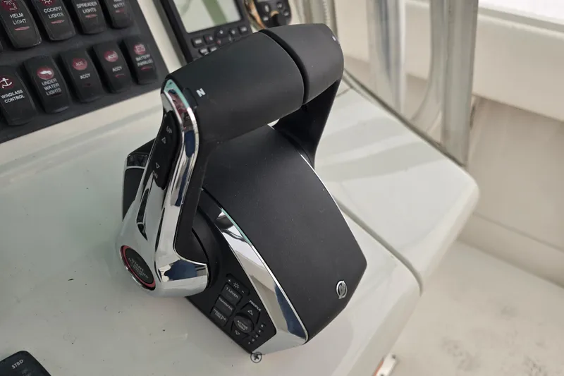  Yacht Photos Pics Boat throttle control on 2010 Jupiter 34 FS console, featuring modern design and functionality.