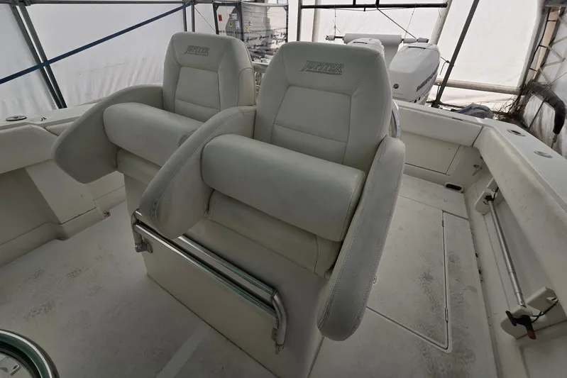  Yacht Photos Pics 2010 Jupiter 34 FS boat interior with dual cushioned seats.