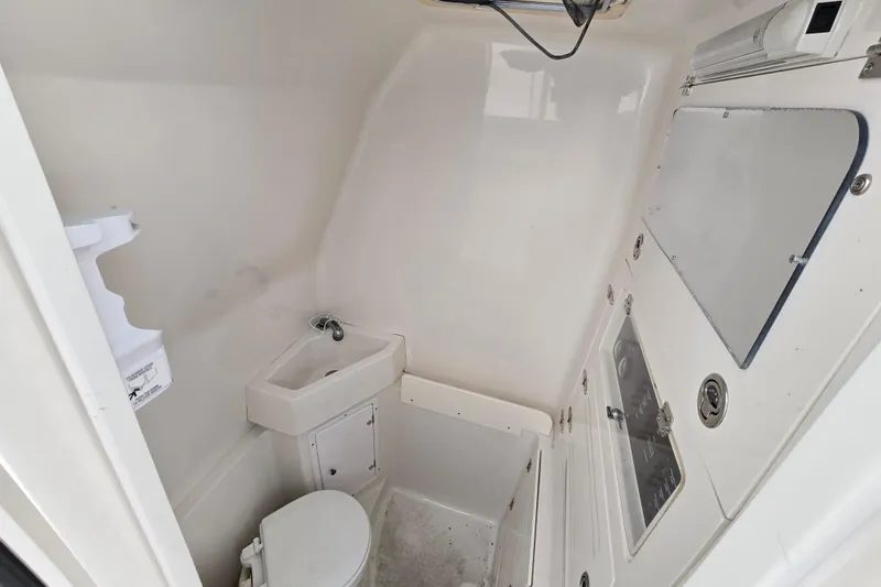  Yacht Photos Pics 2010 Jupiter 34 FS boat bathroom with sink and toilet.