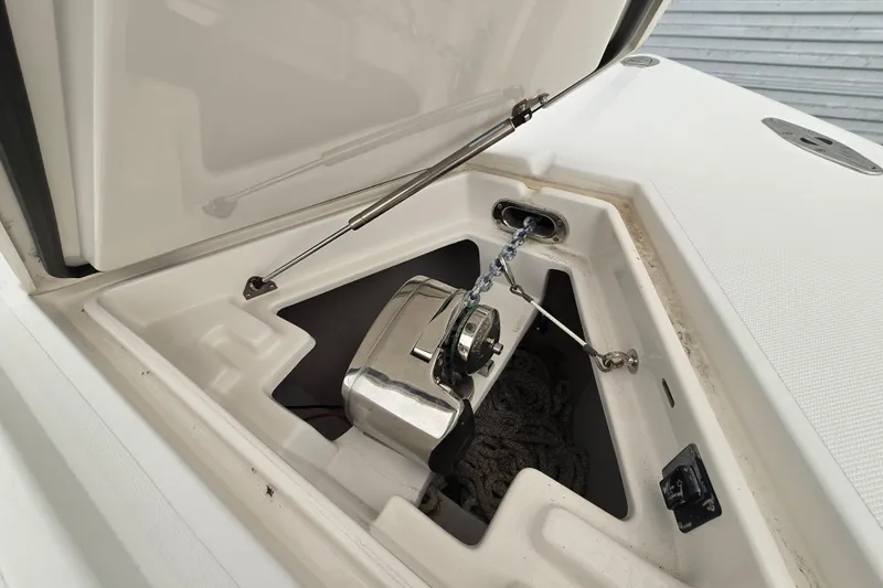  Yacht Photos Pics Anchor compartment of 2010 Jupiter 34 FS boat with chain and winch system.