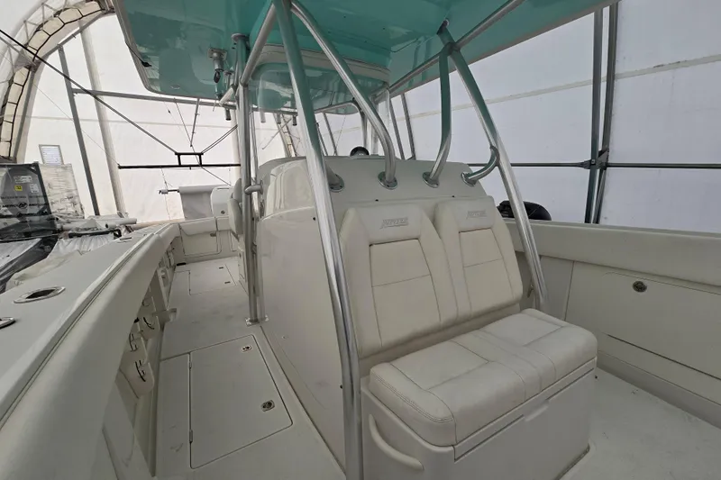  Yacht Photos Pics 2010 Jupiter 34 FS boat interior with white seating and metal framework.