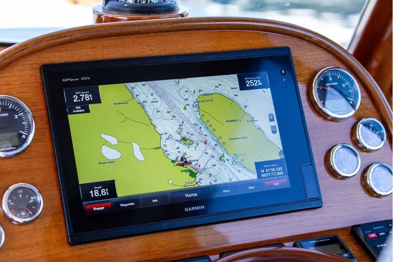 Pisces Yacht Photos Pics Hinckley Picnic Boat MKIII 2017 dashboard with Garmin GPS navigation system and gauges.