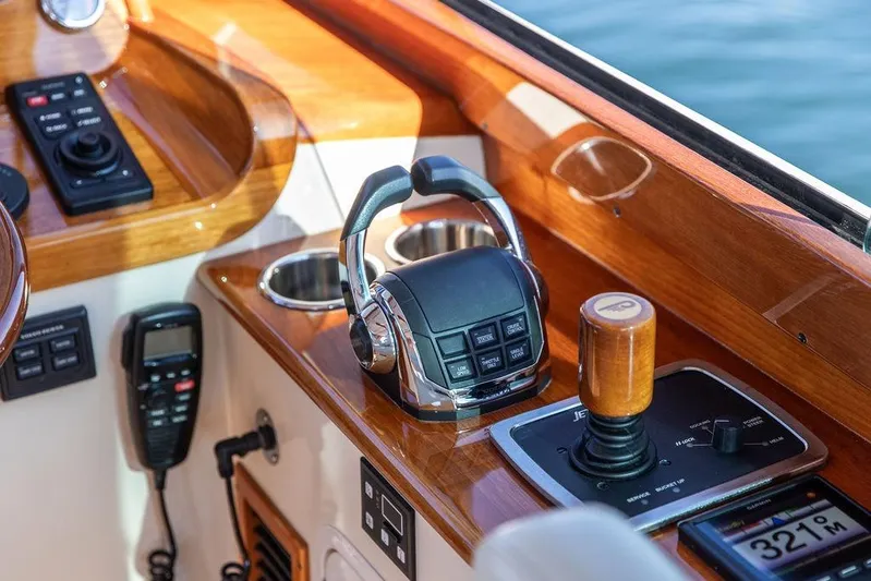 Pisces Yacht Photos Pics 2017 Hinckley Picnic Boat MKIII helm with controls and wooden accents.