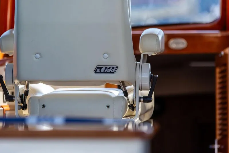 Pisces Yacht Photos Pics Captain's chair on 2017 Hinckley Picnic Boat MKIII, featuring Stidd seating.