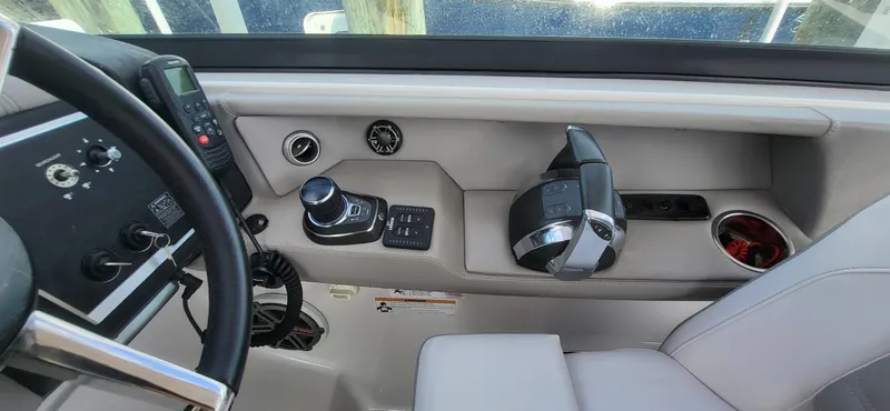  Yacht Photos Pics 2018 Four Winns H350 OB helm with controls and steering wheel.