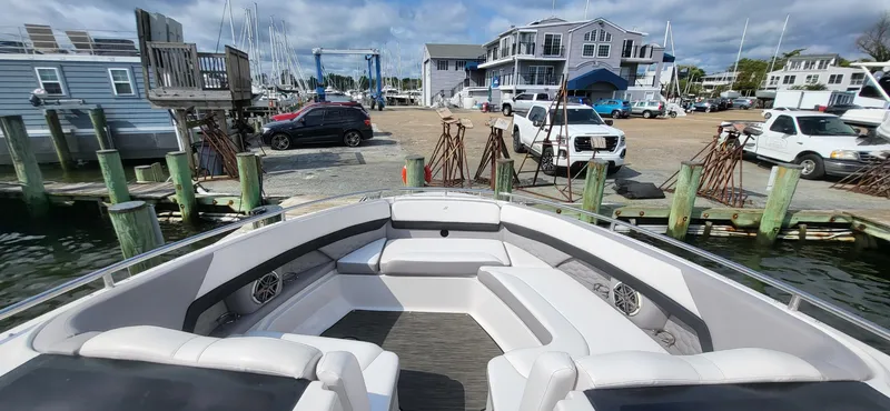  Yacht Photos Pics 2018 Four Winns H350 OB boat docked at a marina with waterfront view.