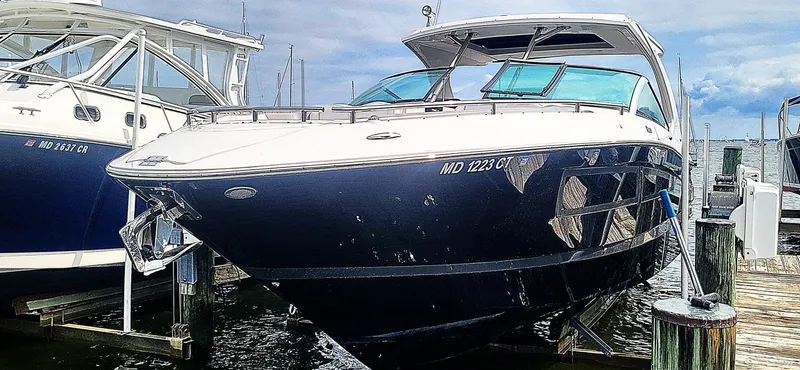  Yacht Photos Pics 2018 Four Winns H350 OB boat docked at marina, front view.