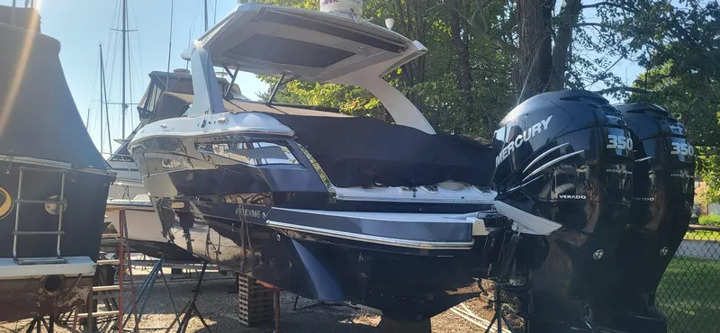  Yacht Photos Pics 2018 Four Winns H350 OB boat with twin Mercury 350 engines, docked outdoors.