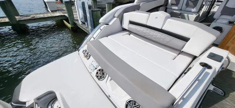  Yacht Photos Pics 2018 Four Winns H350 OB boat with luxurious seating and waterfront view.