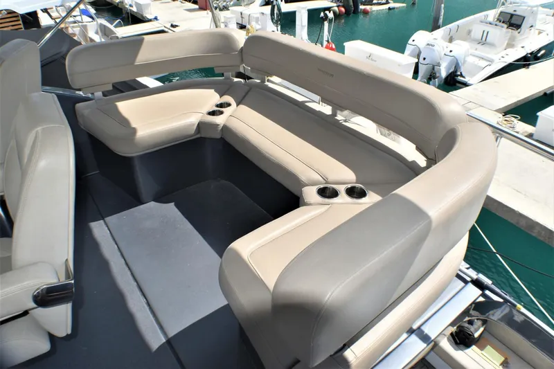  Yacht Photos Pics 2019 Silverton 41 Sport Bridge boat seating area with beige upholstery.