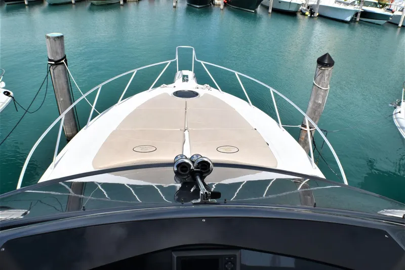  Yacht Photos Pics 2019 Silverton 41 Sport Bridge yacht docked at marina, view from helm.
