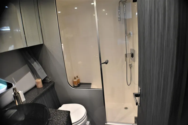  Yacht Photos Pics Modern bathroom in 2019 Silverton 41 Sport Bridge yacht with shower and sleek design.