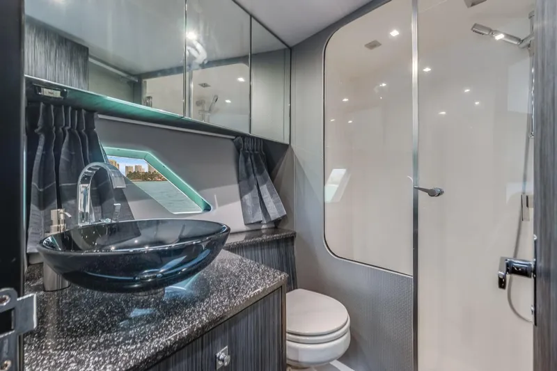  Yacht Photos Pics Modern bathroom in 2019 Silverton 41 Sport Bridge yacht with glass sink and shower.