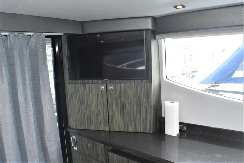  Yacht Photos Pics Interior of 2019 Silverton 41 Sport Bridge with TV and countertop.
