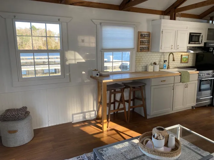  Yacht Photos Pics Cozy kitchen in 2018 Catamaran Cruisers 42 Aqualodge with wooden accents and natural light.