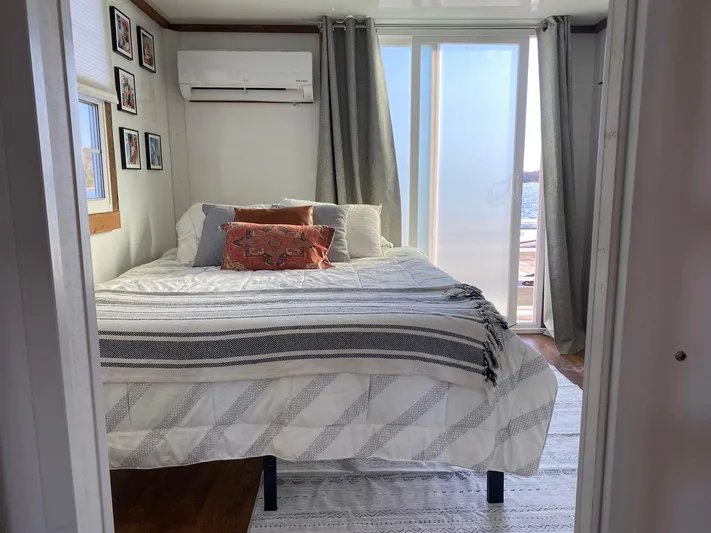  Yacht Photos Pics Cozy bedroom in 2018 Catamaran Cruisers 42 Aqualodge with bed, decor, and natural light.