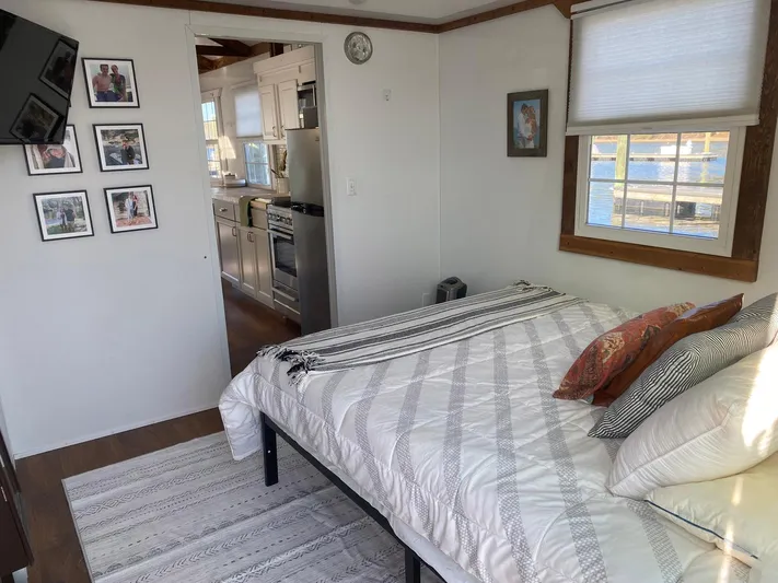  Yacht Photos Pics Interior of 2018 Catamaran Cruisers 42 Aqualodge with cozy bedroom and kitchen view.