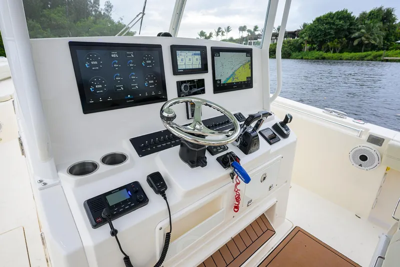 Conched Out Yacht Photos Pics 2020 Cobia 350 CC boat dashboard with advanced navigation and control systems.