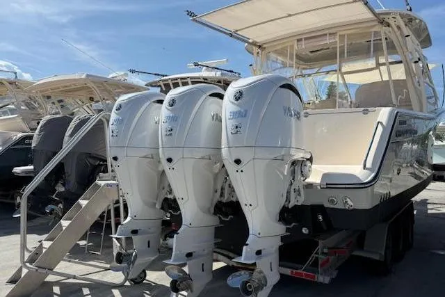 35-514 Brokerage Tyler Yacht Photos Pics 2023 Grady-White Freedom 335 boat with triple Yamaha outboard engines.