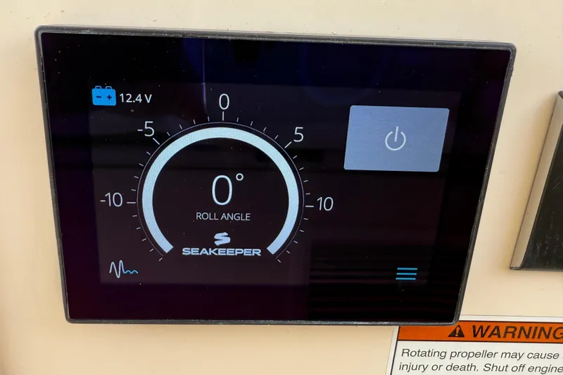 35-514 Brokerage Tyler Yacht Photos Pics Seakeeper control display on 2023 Grady-White Freedom 335 boat, showing roll angle and voltage.