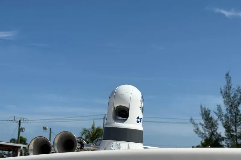 35-514 Brokerage Tyler Yacht Photos Pics 2023 Grady-White Freedom 335 boat with radar equipment against a clear blue sky.