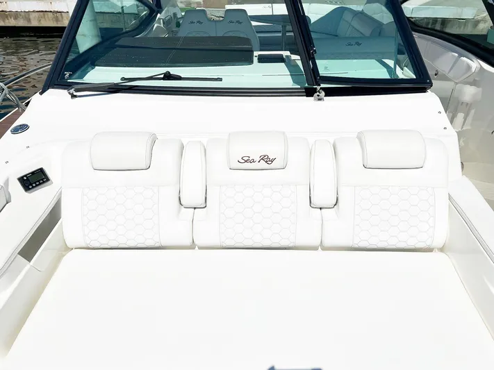 Grateful! Yacht Photos Pics 2019 Sea Ray Sundancer 320 Outboard with luxurious white seating and sleek design.