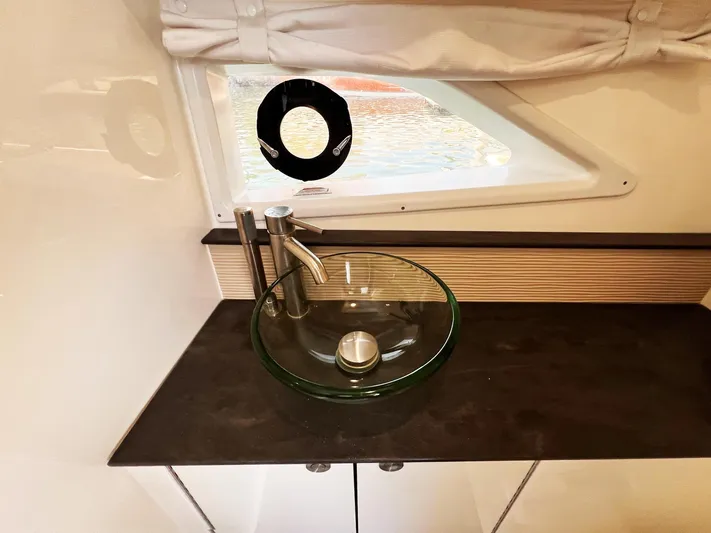 Grateful! Yacht Photos Pics 2019 Sea Ray Sundancer 320 Outboard bathroom with modern glass sink and sleek faucet.