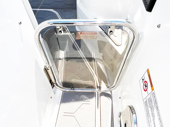 Grateful! Yacht Photos Pics 2019 Sea Ray Sundancer 320 Outboard boat door with stainless steel frame and safety warnings.