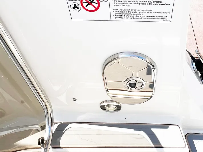 Grateful! Yacht Photos Pics 2019 Sea Ray Sundancer 320 Outboard boat detail with chrome fixture and safety instructions.